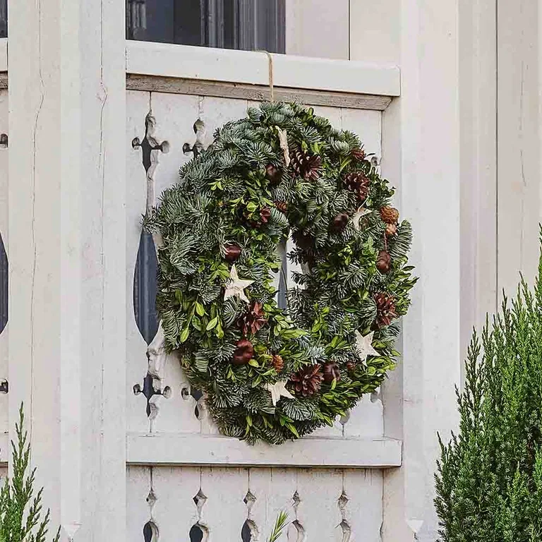 Cram the entrance with different varieties of colorful plants.
